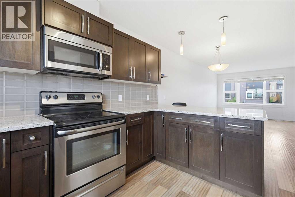 220 Covecreek Circle NE, Calgary, Alberta T3K 0W6 - Photo 10 - A2317858