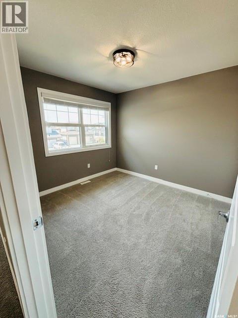 411 Flynn Lane, Saskatoon, Saskatchewan  S7V 0L1 - Photo 23 - SK044080