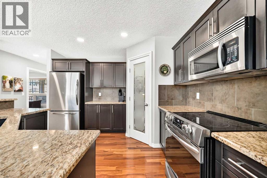 209 Crystal Green Point, Okotoks, Alberta  T1S 2K7 - Photo 8 - A2322719