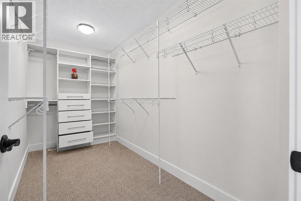 108 Kinniburgh Close, Chestermere, Alberta  T1X 0R8 - Photo 33 - A2331653