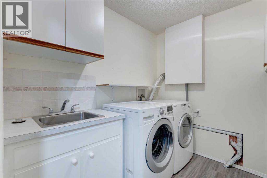 411 Shawinigan Drive SW, Calgary, Alberta  T2Y 3A2 - Photo 27 - A2330883