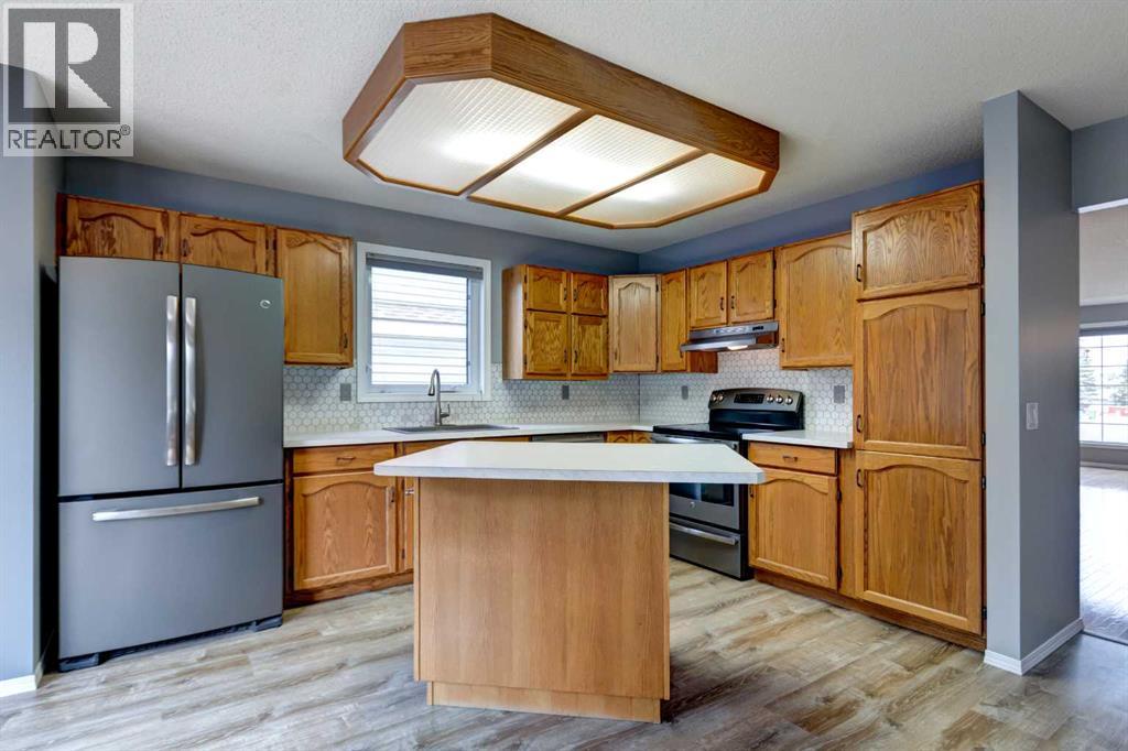 411 Shawinigan Drive SW, Calgary, Alberta  T2Y 3A2 - Photo 10 - A2330883