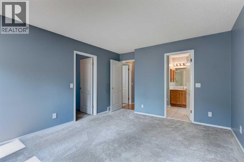 411 Shawinigan Drive SW, Calgary, Alberta  T2Y 3A2 - Photo 13 - A2330883