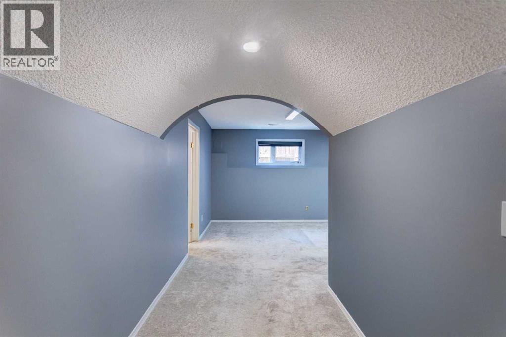 411 Shawinigan Drive SW, Calgary, Alberta  T2Y 3A2 - Photo 21 - A2330883