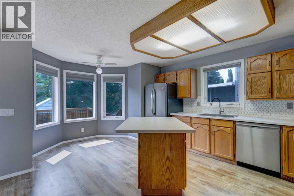 411 Shawinigan Drive SW, Calgary, Alberta  T2Y 3A2 - Photo 7 - A2330883