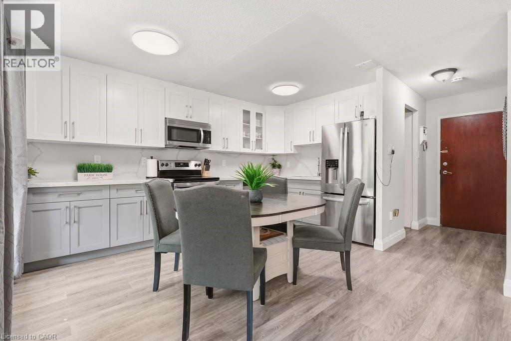 1066 Falgarwood Drive Unit# 154, Oakville, Ontario  L6H 2P3 - Photo 4 - 40846867