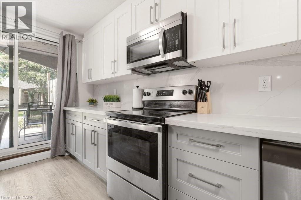 1066 Falgarwood Drive Unit# 154, Oakville, Ontario  L6H 2P3 - Photo 5 - 40846867