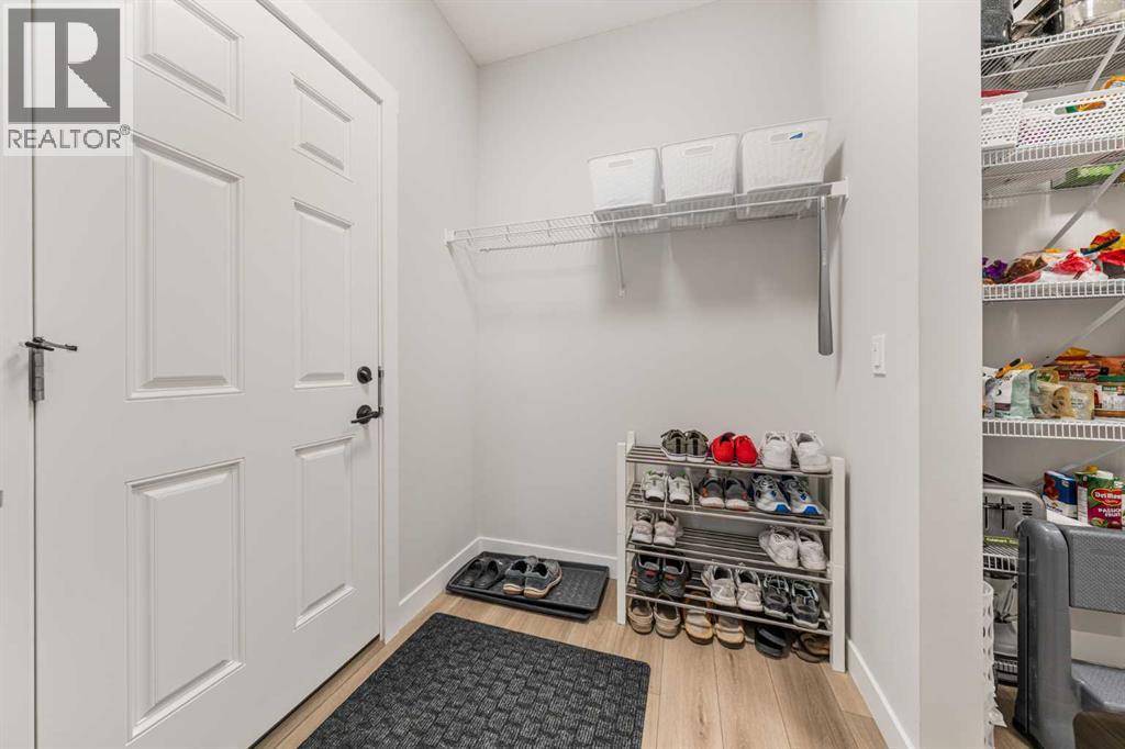 116 Rowmont Heath NW, Calgary, Alberta  T3L 0H8 - Photo 12 - A2323188