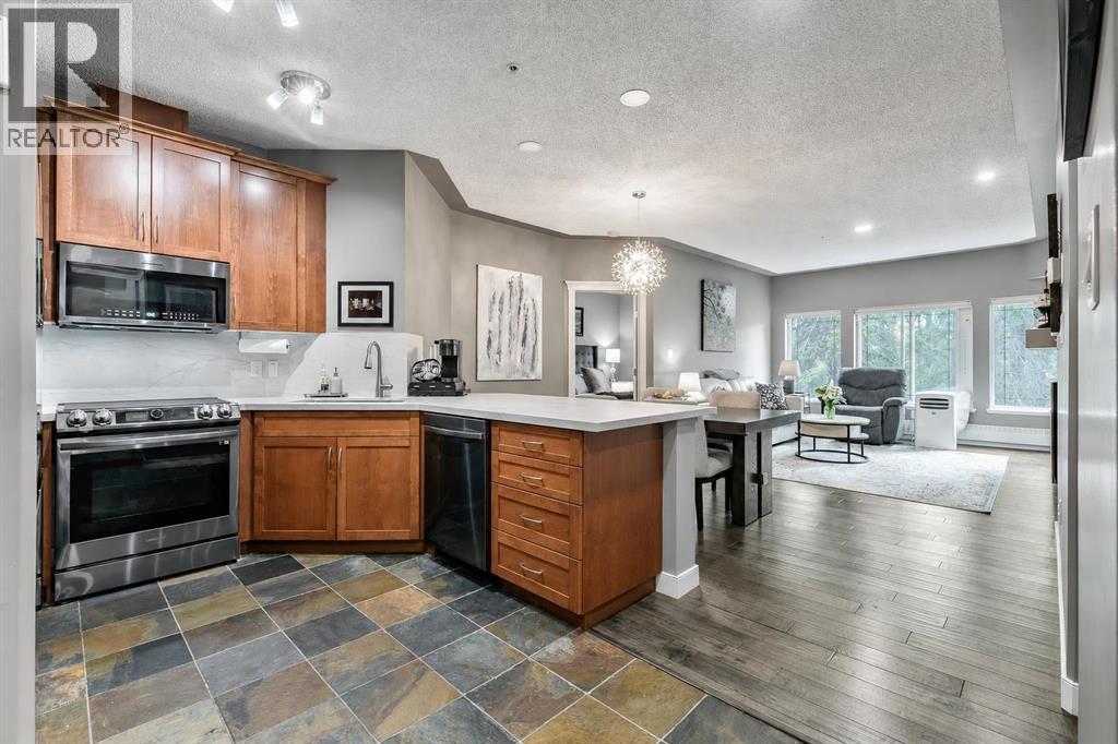 233, 20 Discovery Ridge Close SW, Calgary, Alberta  T3H 5X4 - Photo 1 - A2327336