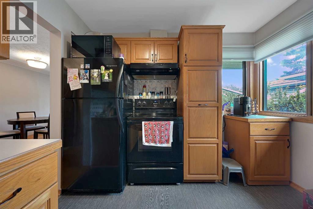 1415 Rosehill Drive NW, Calgary, Alberta  T2K 1M3 - Photo 8 - A2331378