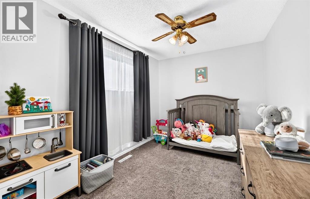 411 Woodland Crescent SE, Calgary, Alberta  T2J 1J7 - Photo 19 - A2332815