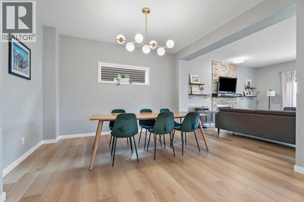 6 Storm Mountain Place, Okotoks, Alberta  T1S 0L6 - Photo 6 - A2333482