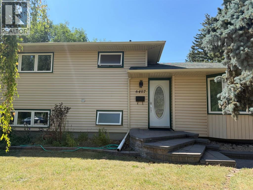 6407 Lombardy Crescent SW, Calgary, Alberta  T3E 5R3 - Photo 3 - A2332874