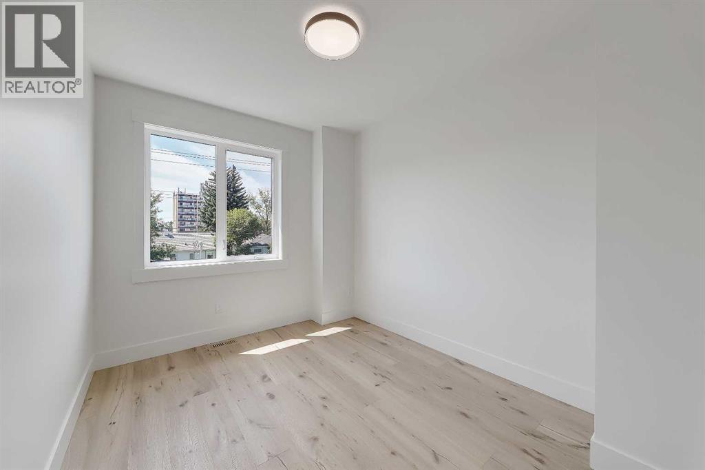1009 18 Avenue Nw, Calgary, Alberta  T2M 0V8 - Photo 26 - A2330120