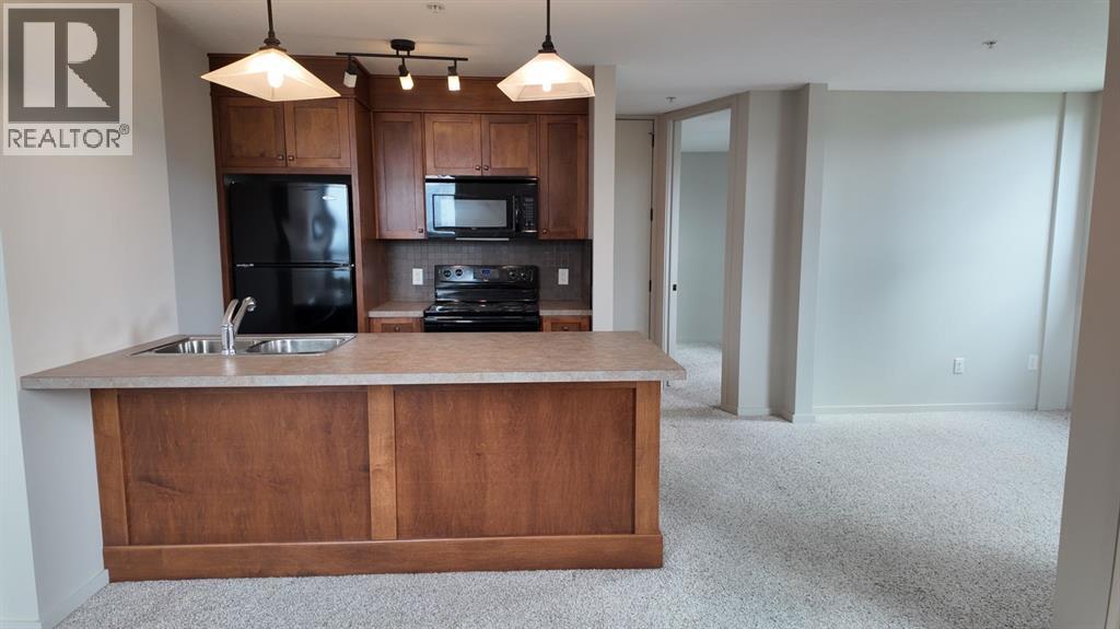1103, 105 Railway Avenue SW, Airdrie, Alberta  T4B 0E3 - Photo 2 - A2332998