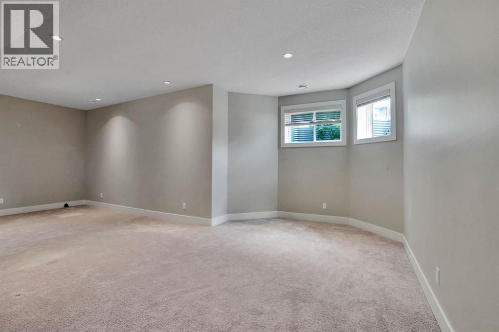 113 Kinniburgh Bay, Chestermere, Alberta  T1X 0M2 - Photo 39 - A2329091