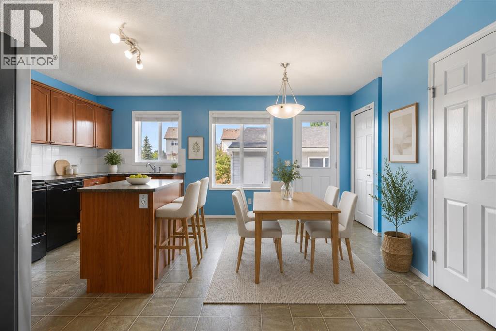 49 Evermeadow Manor SW, Calgary, Alberta  T2Y 4W8 - Photo 8 - A2332494