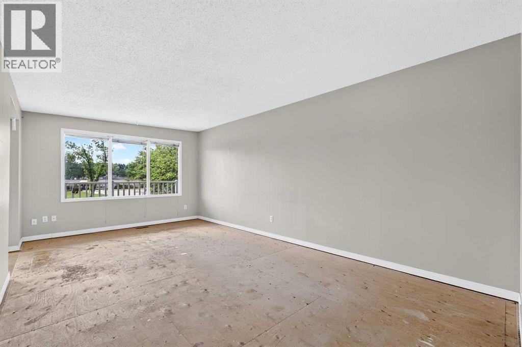 42 Huntford Close NE, Calgary, Alberta  T2k 3Y6 - Photo 6 - A2323008