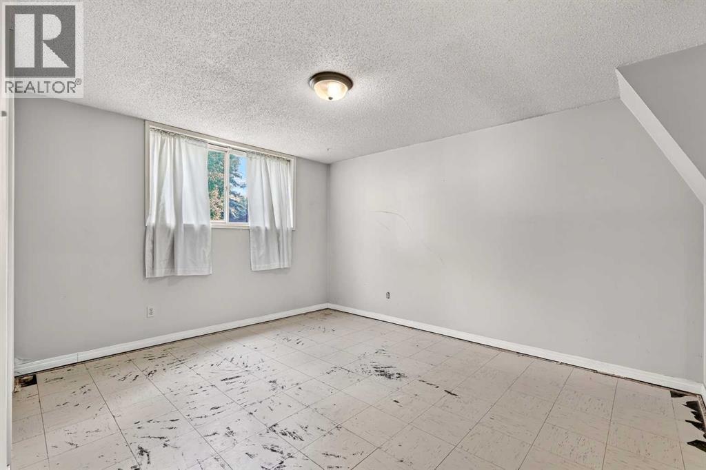 42 Huntford Close NE, Calgary, Alberta  T2k 3Y6 - Photo 36 - A2323008