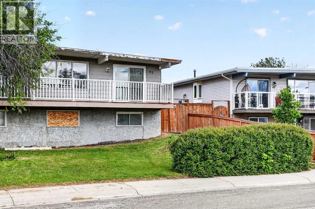 42 Huntford Close NE, Calgary, Alberta  T2k 3Y6 - Photo 3 - A2323008