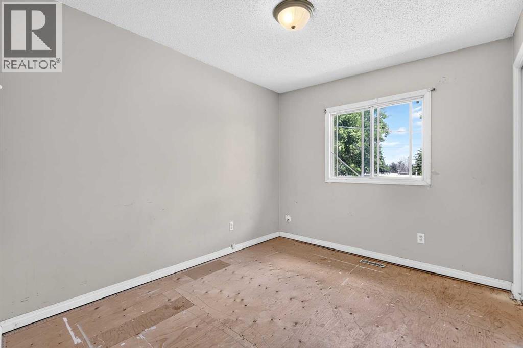 42 Huntford Close NE, Calgary, Alberta  T2k 3Y6 - Photo 26 - A2323008