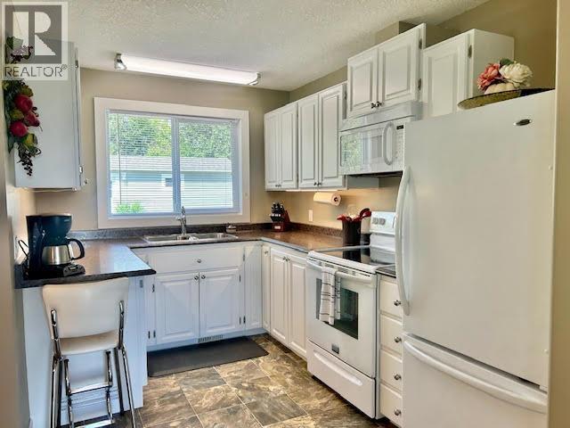 5208 W 54 Avenue, Fort Nelson, British Columbia  V0C 1R0 - Photo 18 - R3143160