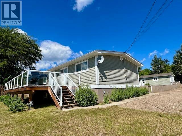 5208 W 54 Avenue, Fort Nelson, British Columbia  V0C 1R0 - Photo 3 - R3143160