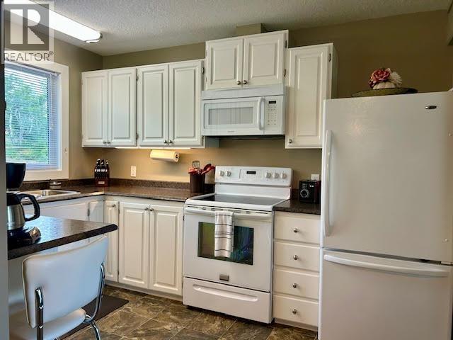 5208 W 54 Avenue, Fort Nelson, British Columbia  V0C 1R0 - Photo 19 - R3143160