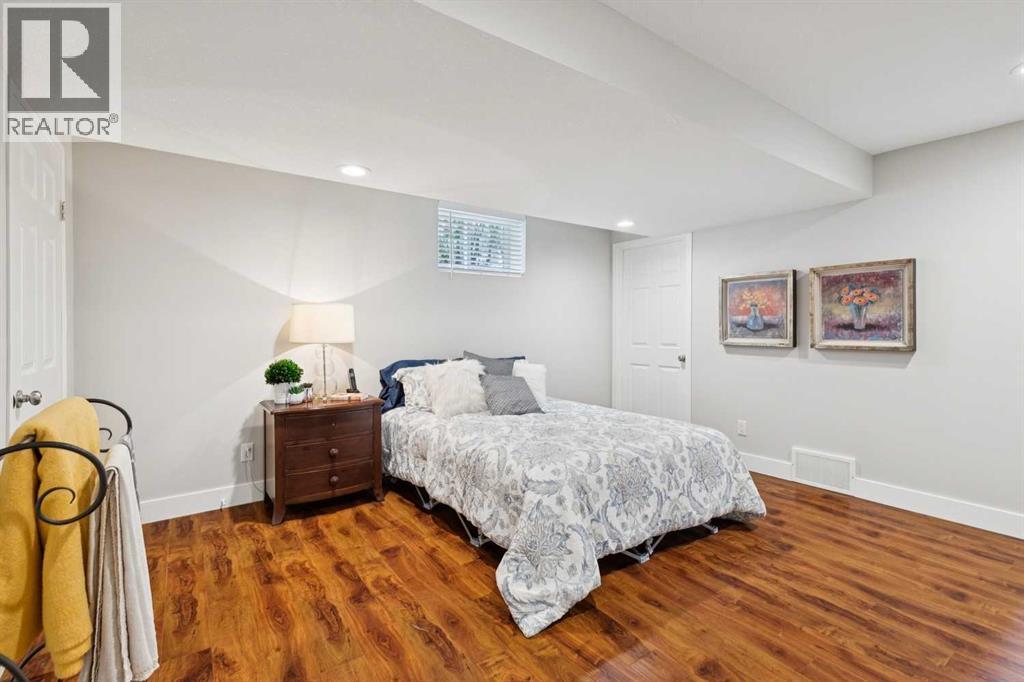 58 Candle Terrace Sw, Calgary, Alberta T2W 6G7 - Photo 37 - A2331780