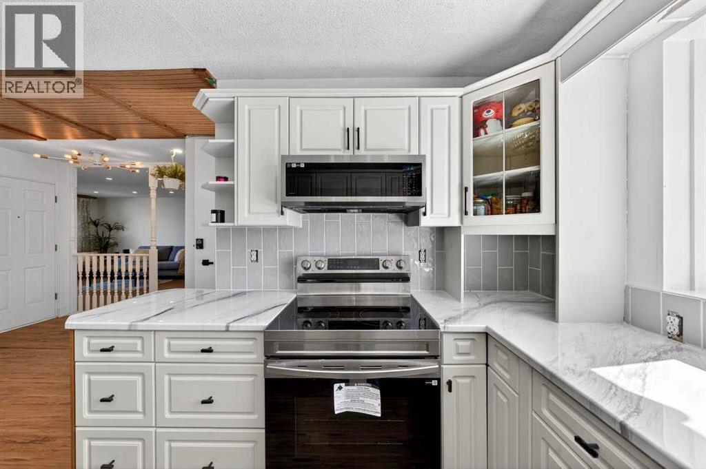 227 Martell Road NE, Calgary, Alberta  T2A 2X2 - Photo 11 - A2312097