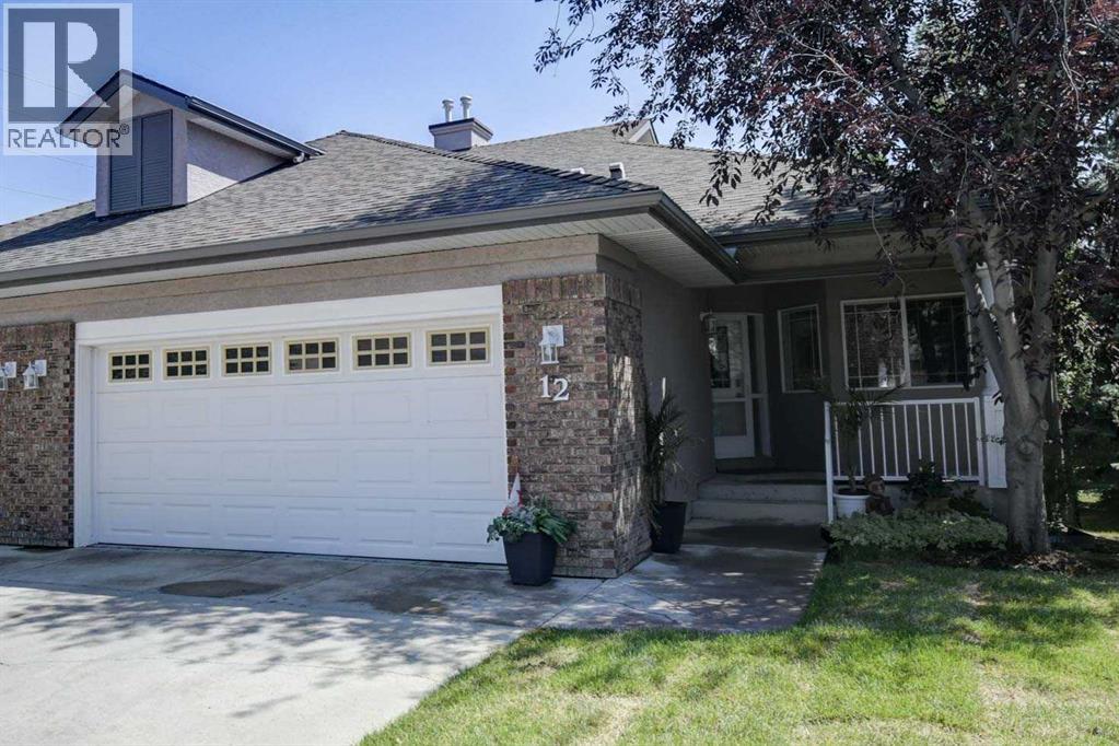 12 Straddock Villas SW, Calgary, Alberta  T3H 5C7 - Photo 1 - A2333003