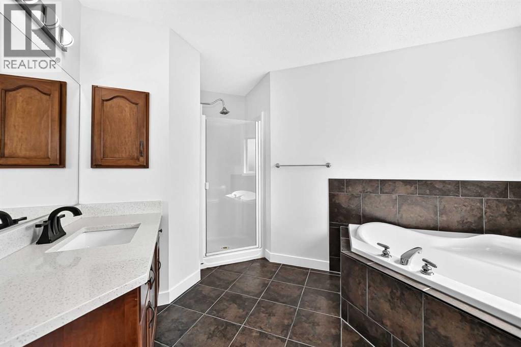 98 Panamount Villas Nw, Calgary, Alberta  T3K 0A4 - Photo 25 - A2329386