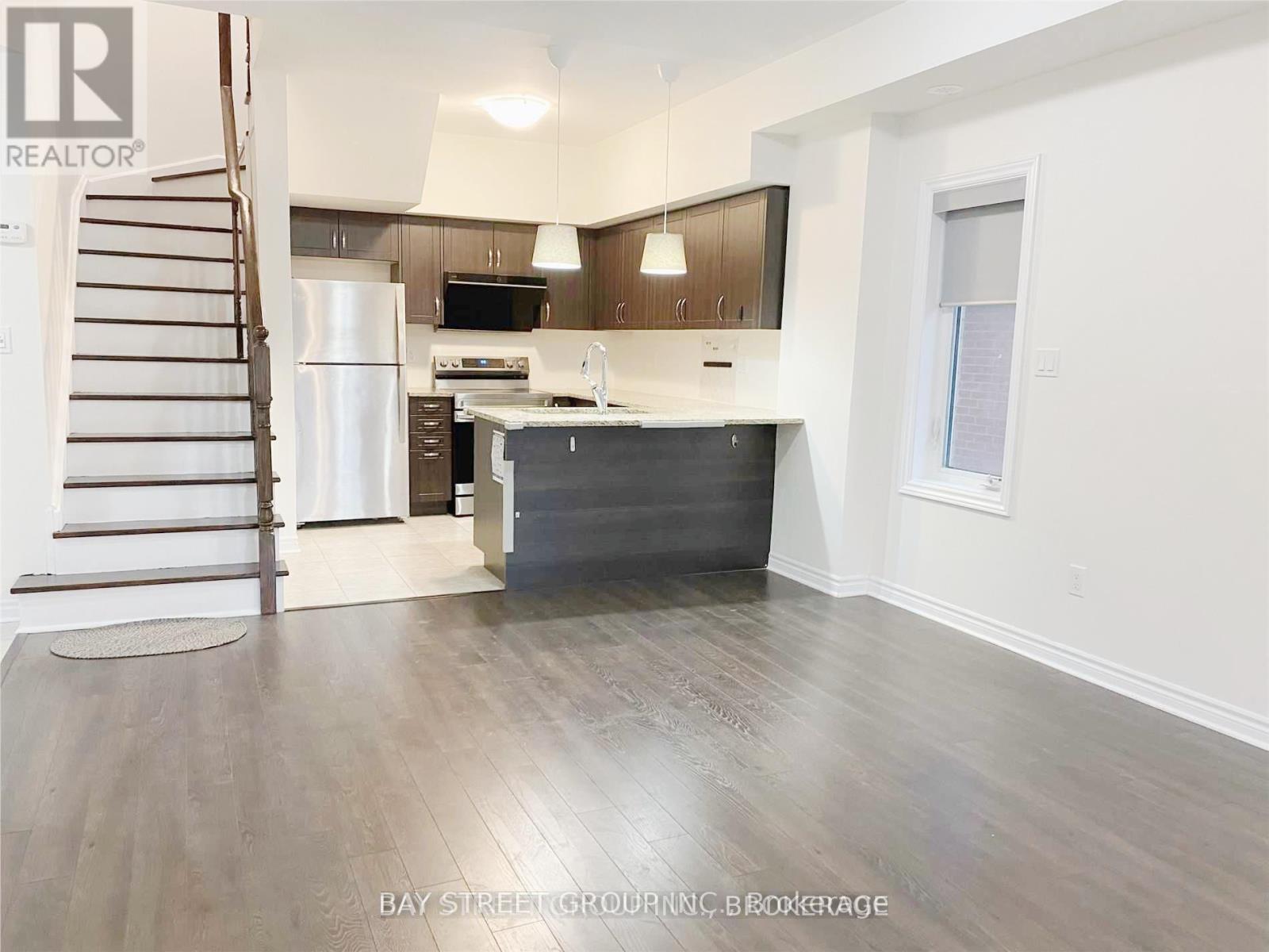 23 - 11 Eaton Park Lane, Toronto, Ontario M1W 0A5 - Photo 2 - E13624000