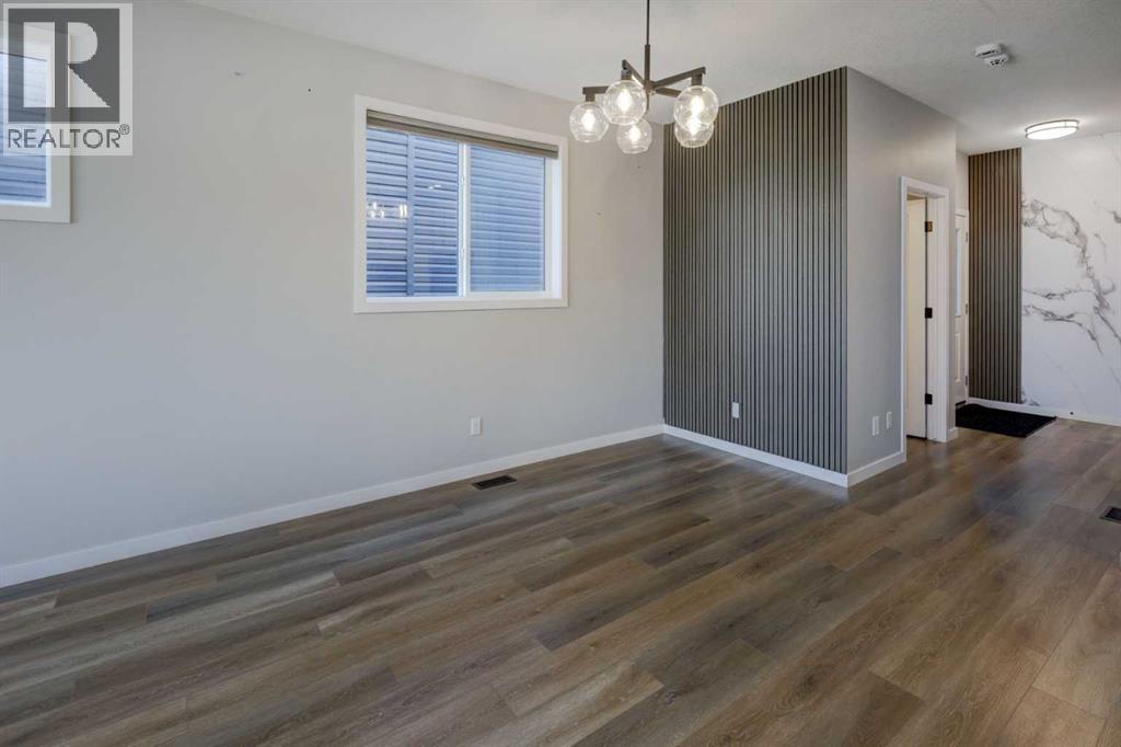 112 Emberside Place, Cochrane, Alberta  T4C 3A8 - Photo 7 - A2325257