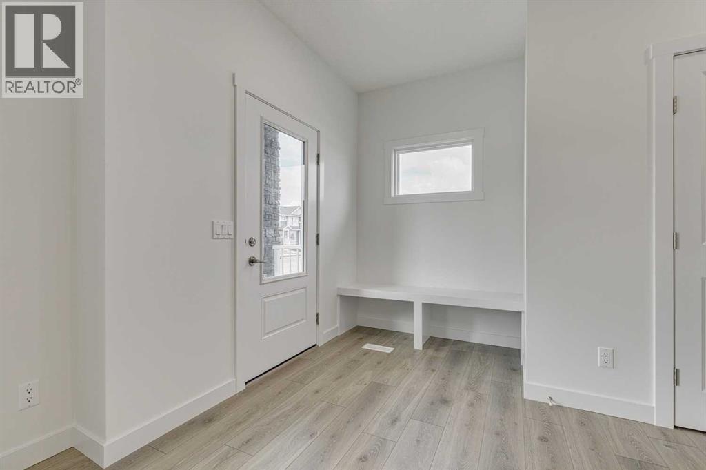 208 Belmont Way SW, Calgary, Alberta  T2X 5T5 - Photo 2 - A2302201