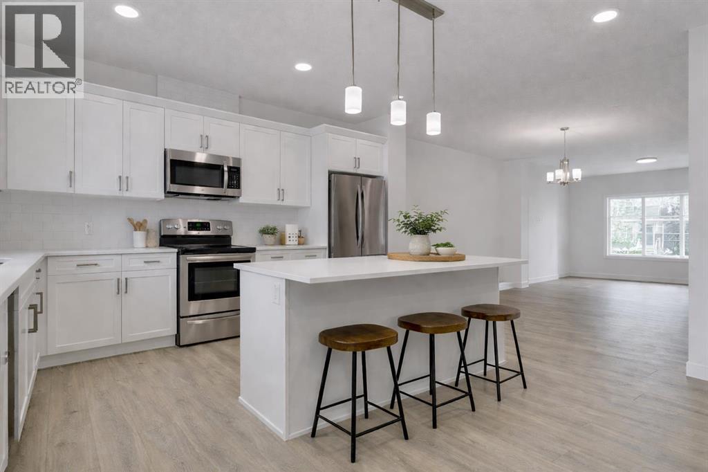 208 Belmont Way SW, Calgary, Alberta  T2X 5T5 - Photo 5 - A2302201