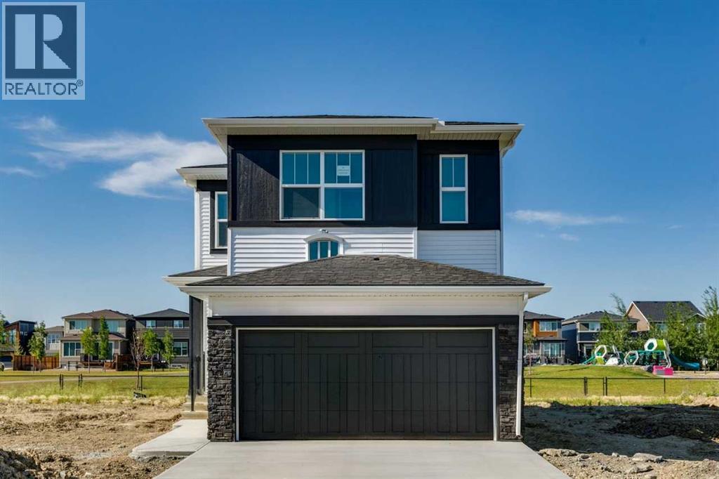 98 Creekstone Place SW, Calgary, Alberta  T2X 5M9 - Photo 1 - A2296722