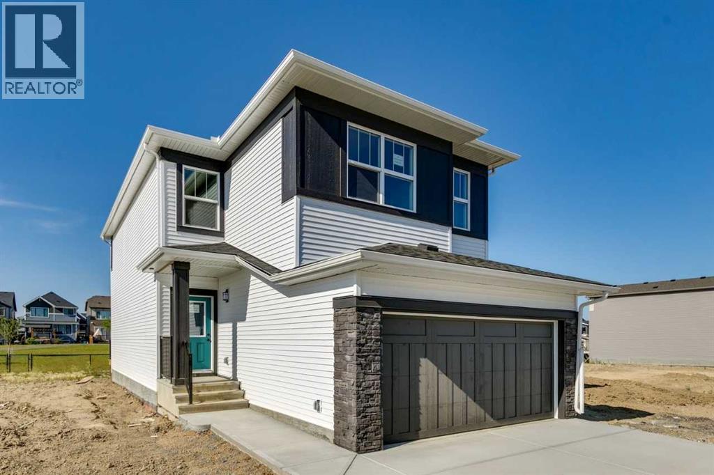 98 Creekstone Place SW, Calgary, Alberta  T2X 5M9 - Photo 2 - A2296722