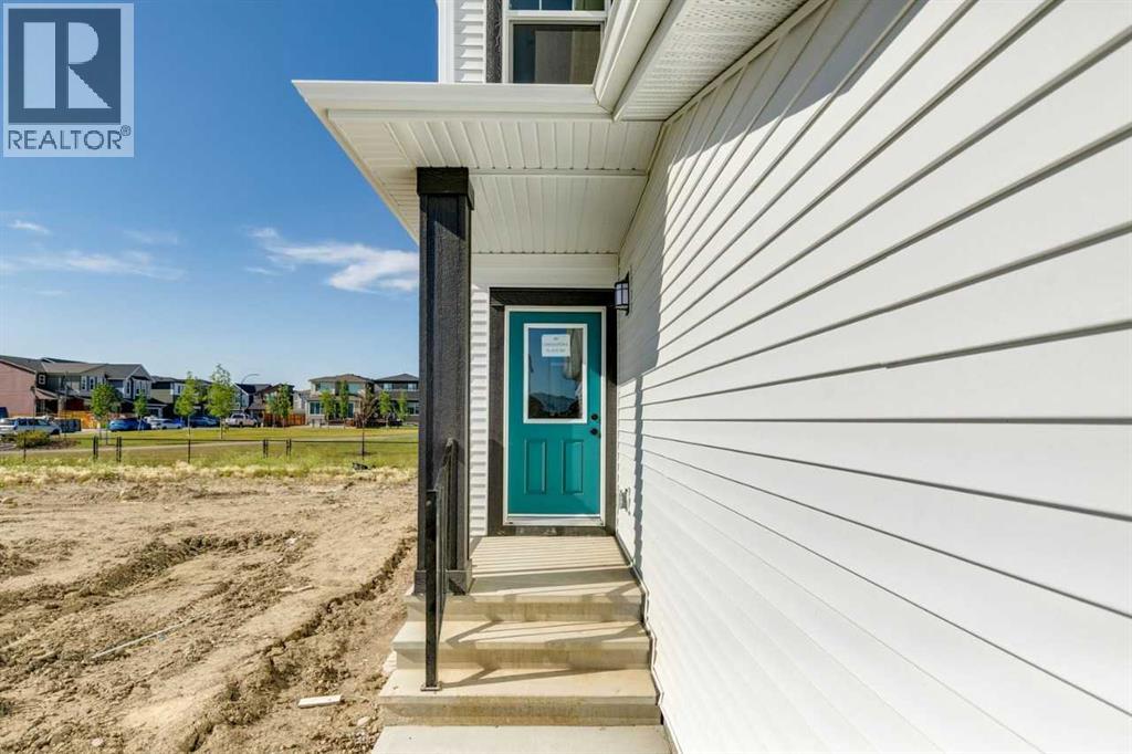 98 Creekstone Place SW, Calgary, Alberta  T2X 5M9 - Photo 3 - A2296722