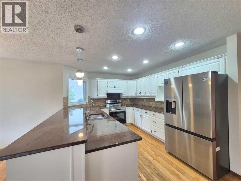 7 Suncastle Crescent SE, Calgary, Alberta  T2X 2W9 - Photo 9 - A2324587