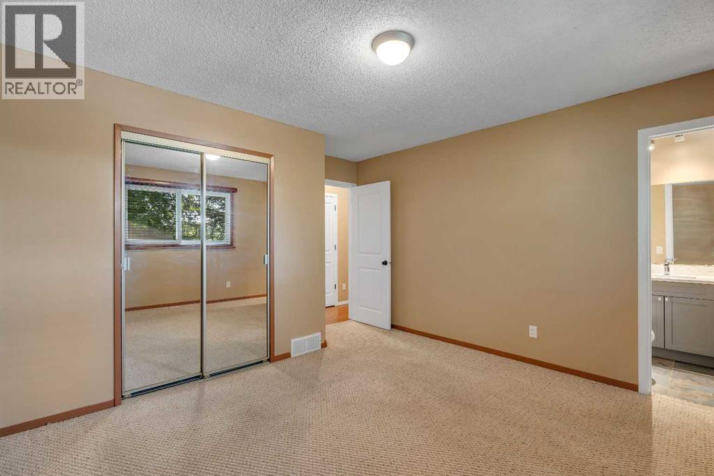 335 Queensland Drive SE, Calgary, Alberta  T2J 3R6 - Photo 15 - A2330083