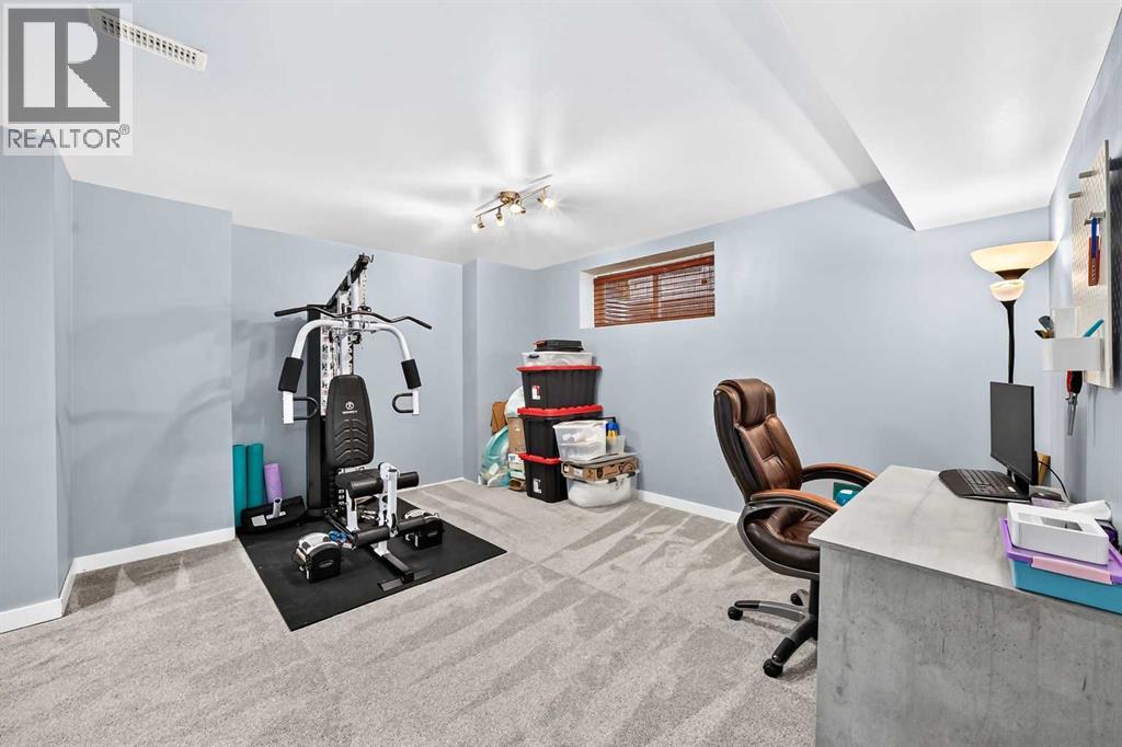 22 Everwillow Circle SW, Calgary, Alberta  T2V 4V2 - Photo 29 - A2327463
