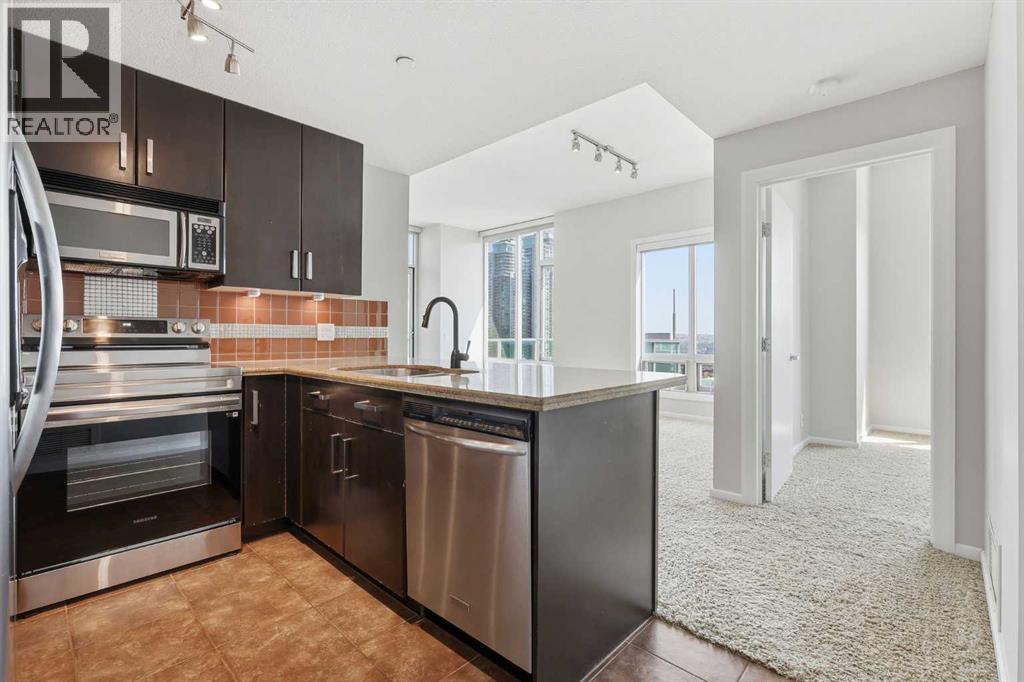 1505, 1410 1 Street SE, Calgary, Alberta  T2G 5T7 - Photo 3 - A2332777