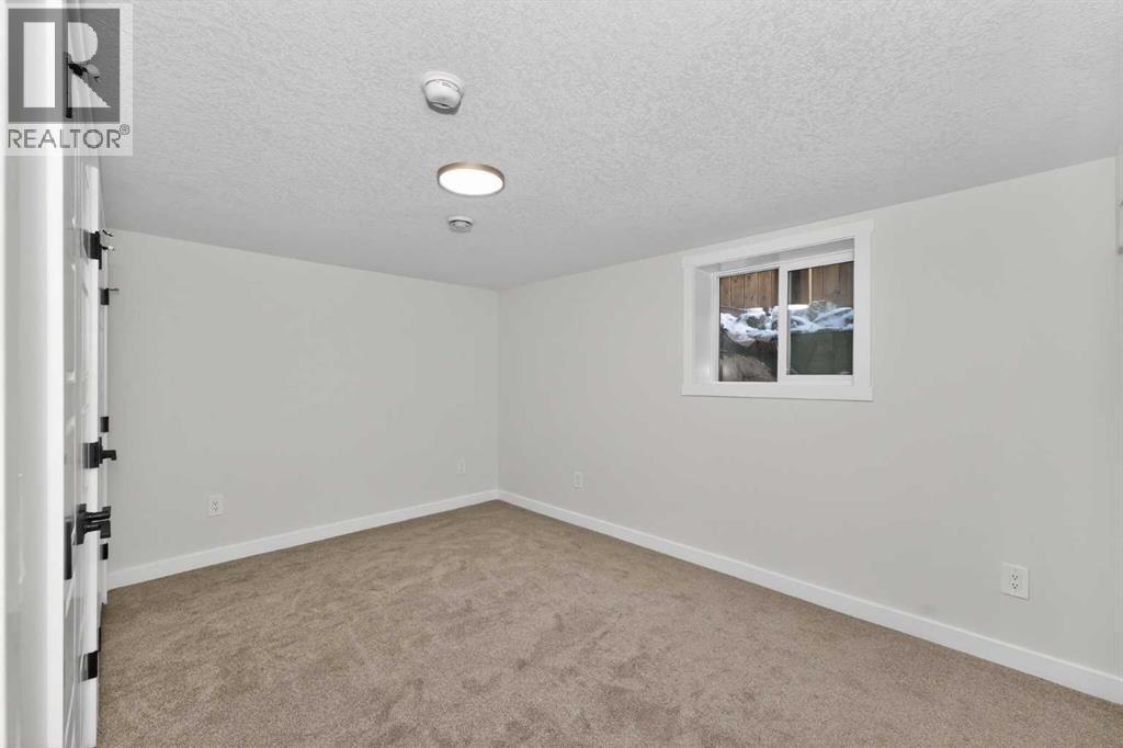 12031 Candiac Road Sw, Calgary, Alberta  T2W 1L1 - Photo 24 - A2330406