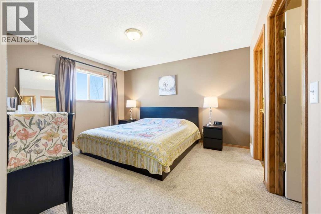 129 Arbour Ridge Circle NW, Calgary, Alberta  T3G 3Y9 - Photo 19 - A2333752