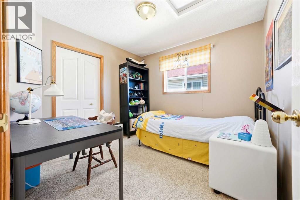 129 Arbour Ridge Circle NW, Calgary, Alberta  T3G 3Y9 - Photo 14 - A2333752
