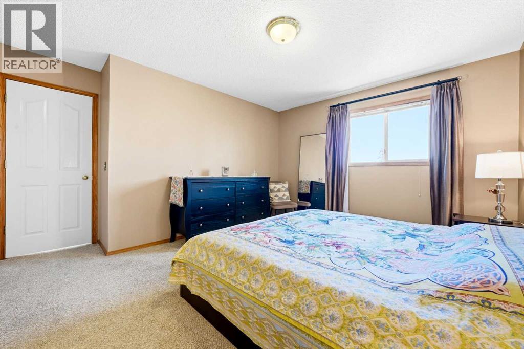 129 Arbour Ridge Circle NW, Calgary, Alberta  T3G 3Y9 - Photo 21 - A2333752