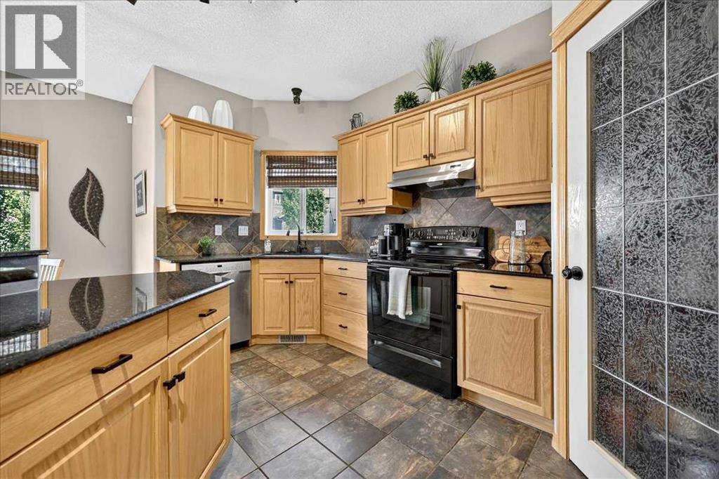 1418 Kings Heights Boulevard SE, Airdrie, Alberta  T4A 0A1 - Photo 12 - A2331682