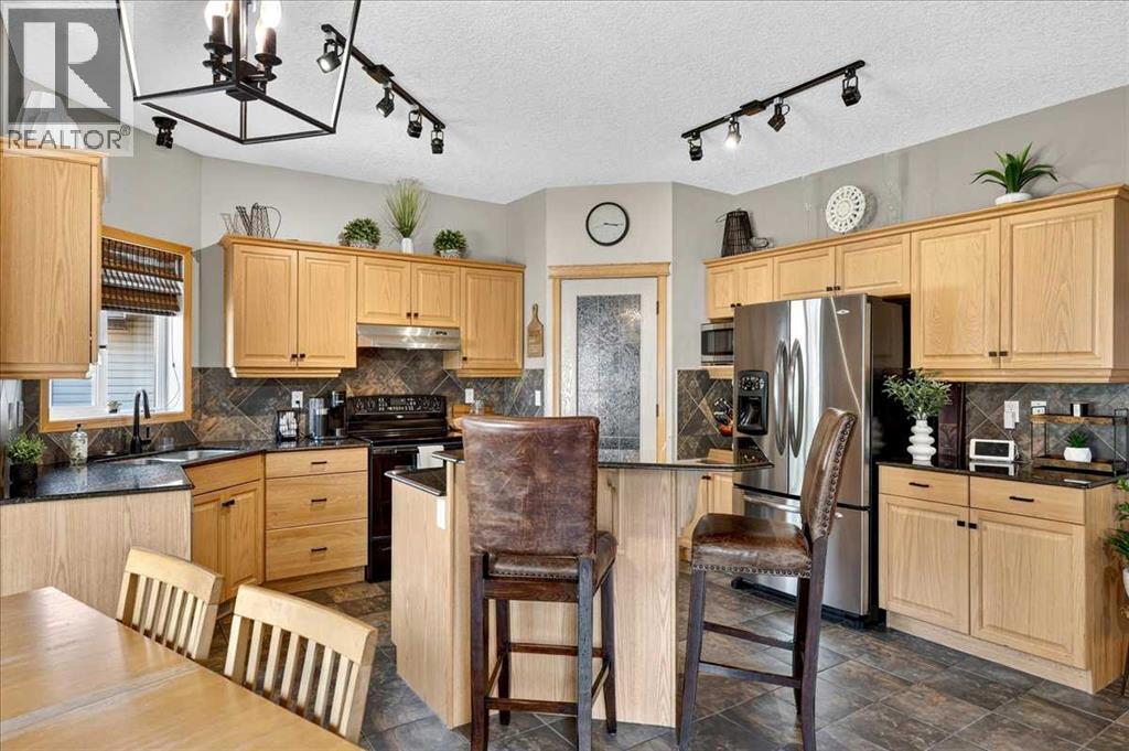 1418 Kings Heights Boulevard SE, Airdrie, Alberta  T4A 0A1 - Photo 11 - A2331682