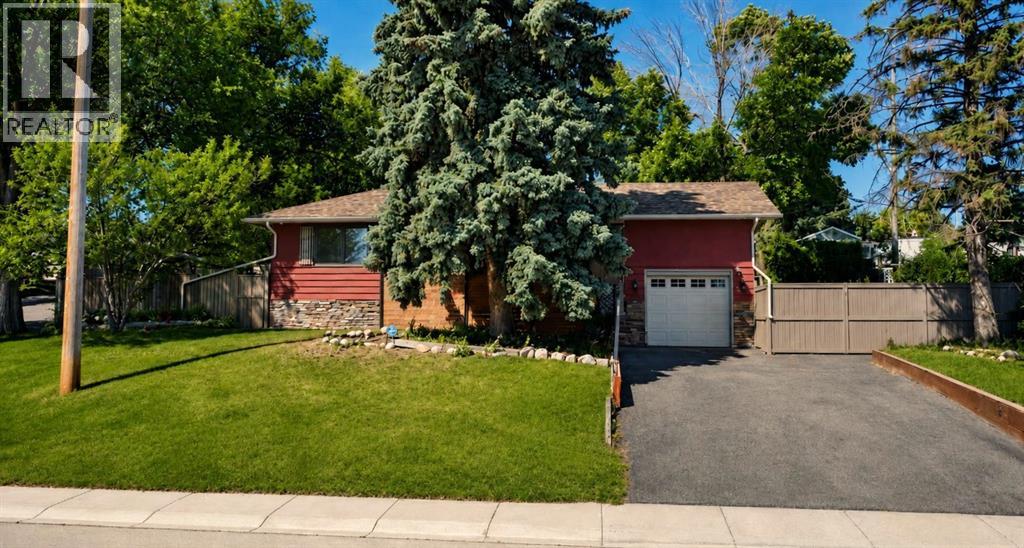 5923 Thorncliffe Drive Nw, Calgary, Alberta  T2K 2Z9 - Photo 2 - A2328930